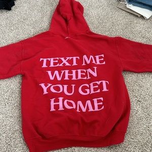 a sweatshirt from a brand called lonely ghost